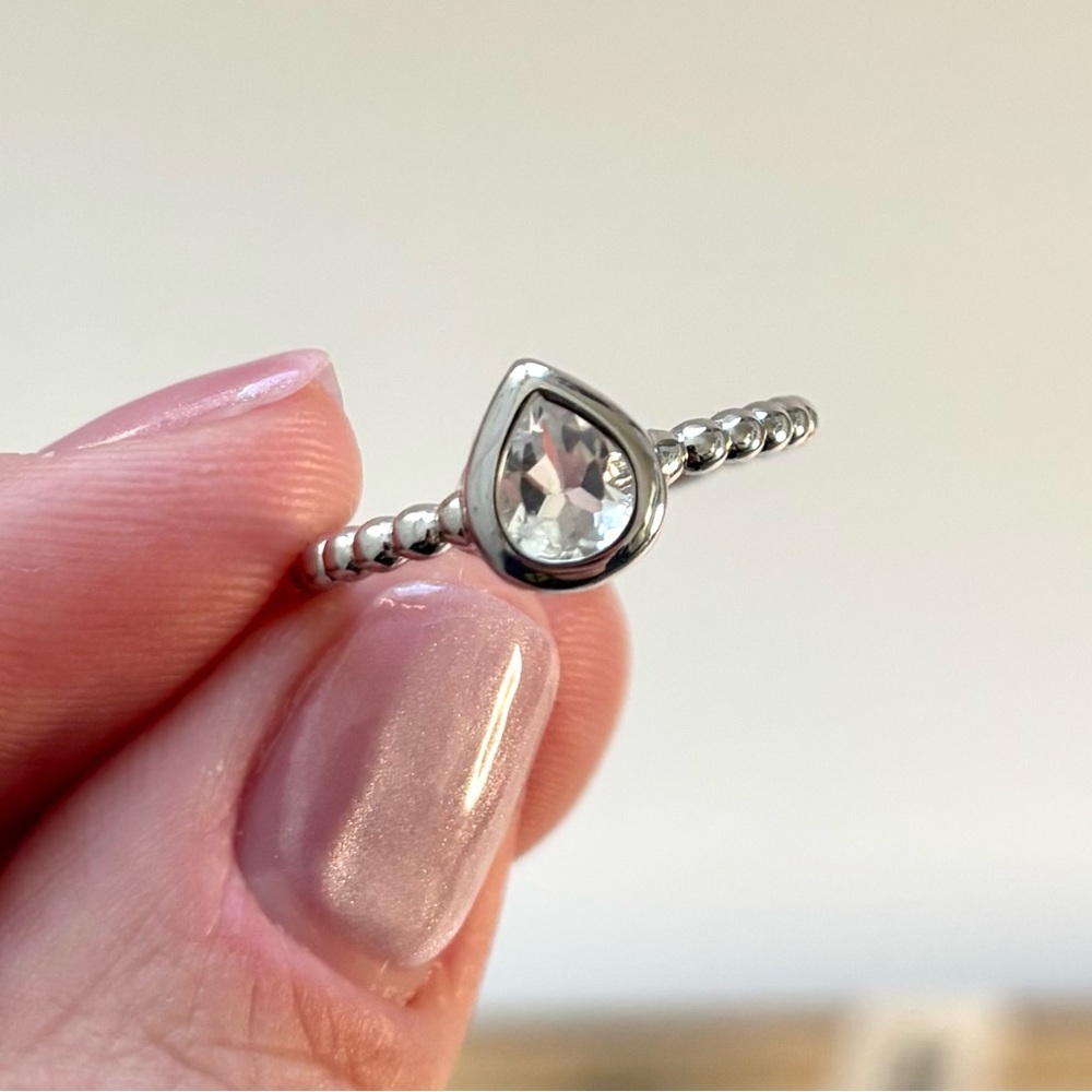 Silver pear-shaped white topaz solitaire ring
